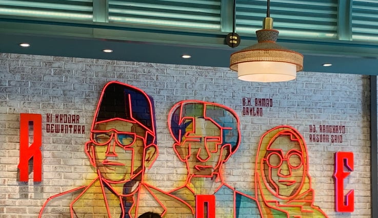 Image shows the mural wall of three monumental historical figures of Indonesia